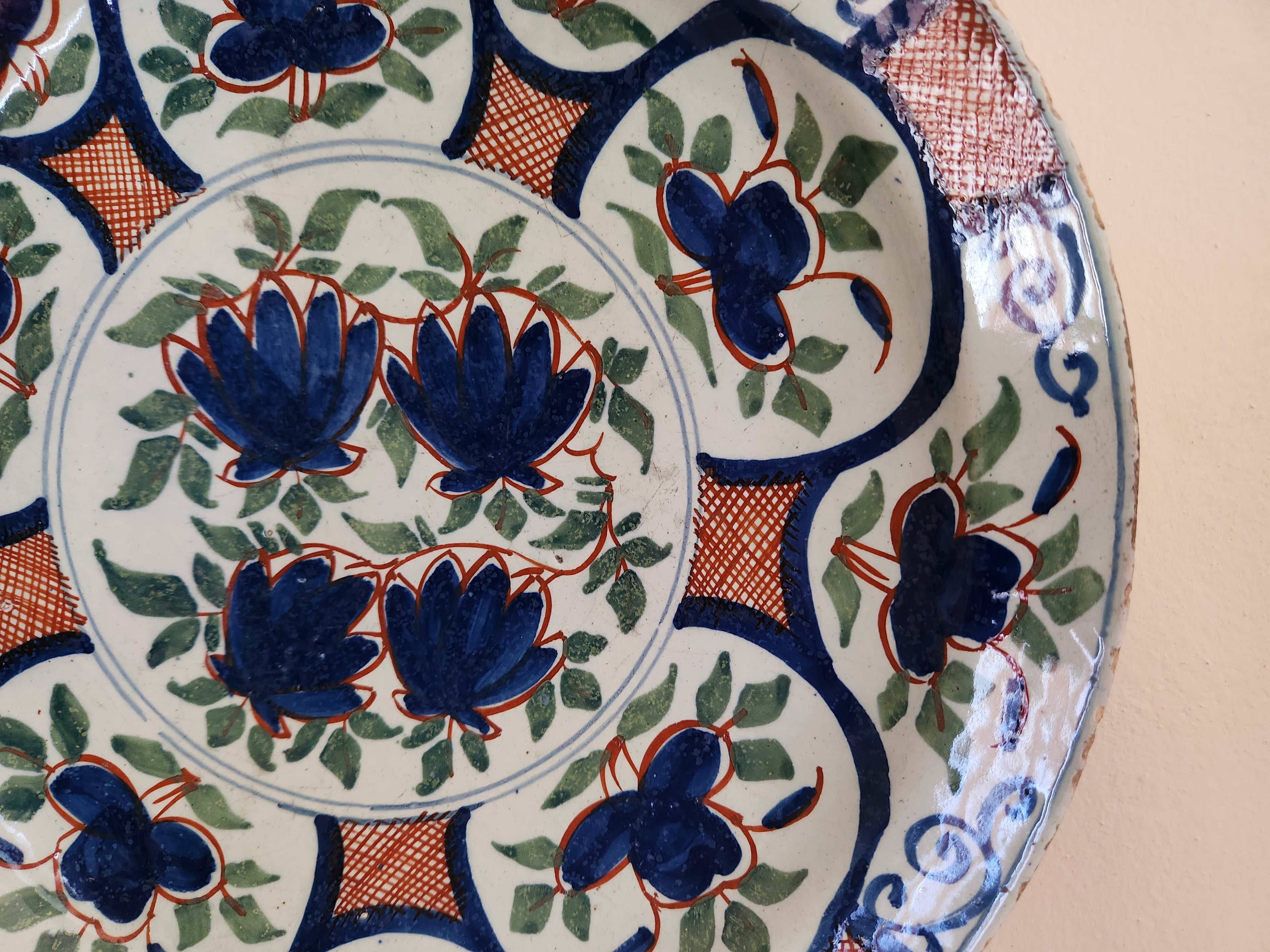 Plate with a hand-painted floral pattern